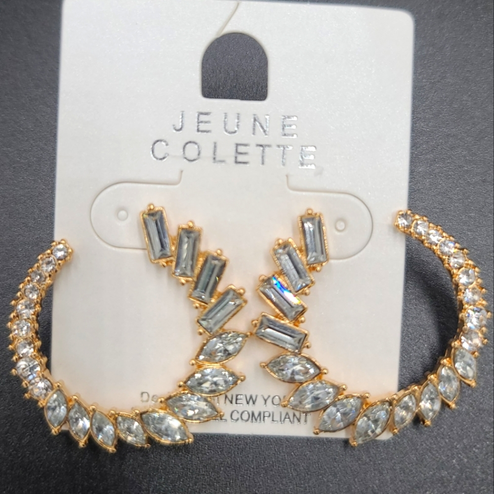 Gold tone Cresent studded Cubic Zirconia earrings
